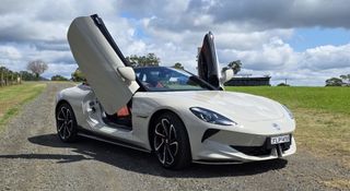 The MG Cyberster roadster electric car with its doors open