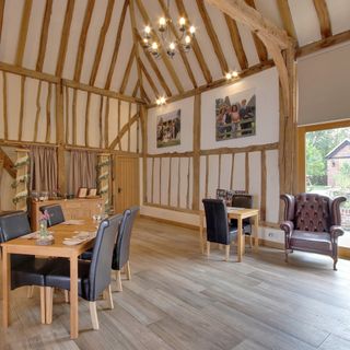 buss farm with wooden floor and dining table