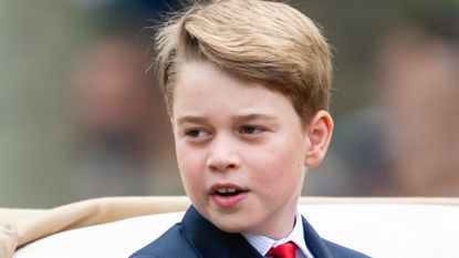 Prince George riding in the carriage at Trooping the Colour