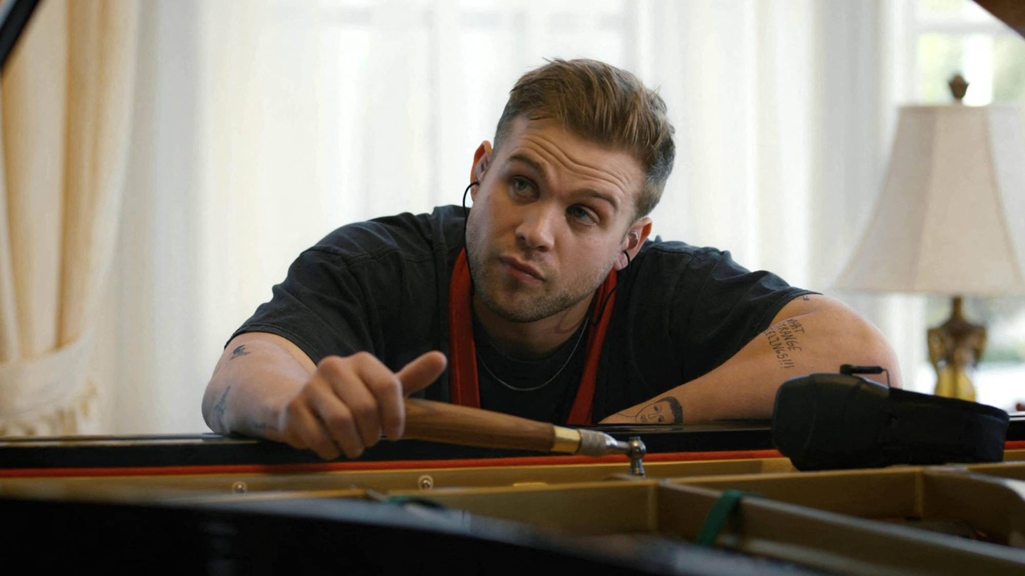 Leo Woodall as Niki White in "Tuner"