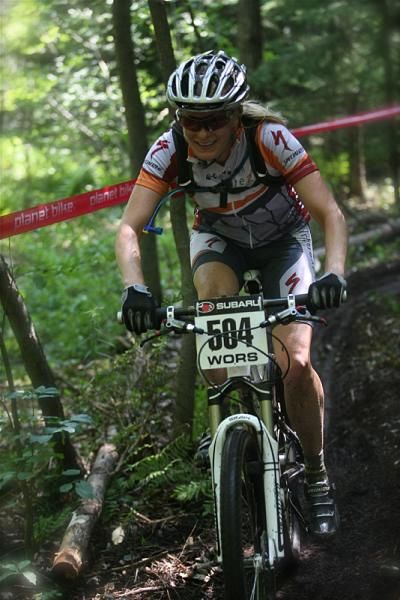 Women's winner Lisa Krayer alone in the singletrack.