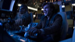 Han Solo and Chewbacca piloting Millennium Falcon