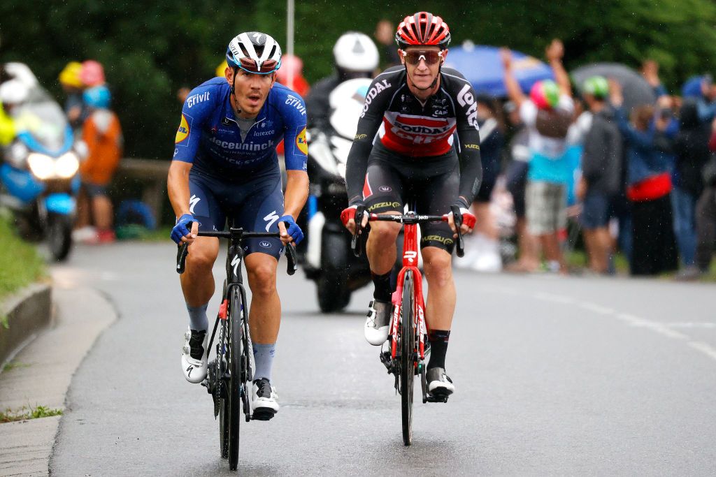 TIGNES FRANCE JULY 04 Davide Ballerini of Italy and Team Deceuninck QuickStep Harry Sweeny of Australia and Team Lotto Soudal in breakaway during the 108th Tour de France 2021 Stage 9 a 1449km stage from Cluses to Tignes Monte de Tignes 2107m LeTour TDF2021 on July 04 2021 in Tignes France Photo by Chris GraythenGetty Images