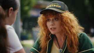 Natasha Lyonne talking to a little girl in Poker Face Season 2.