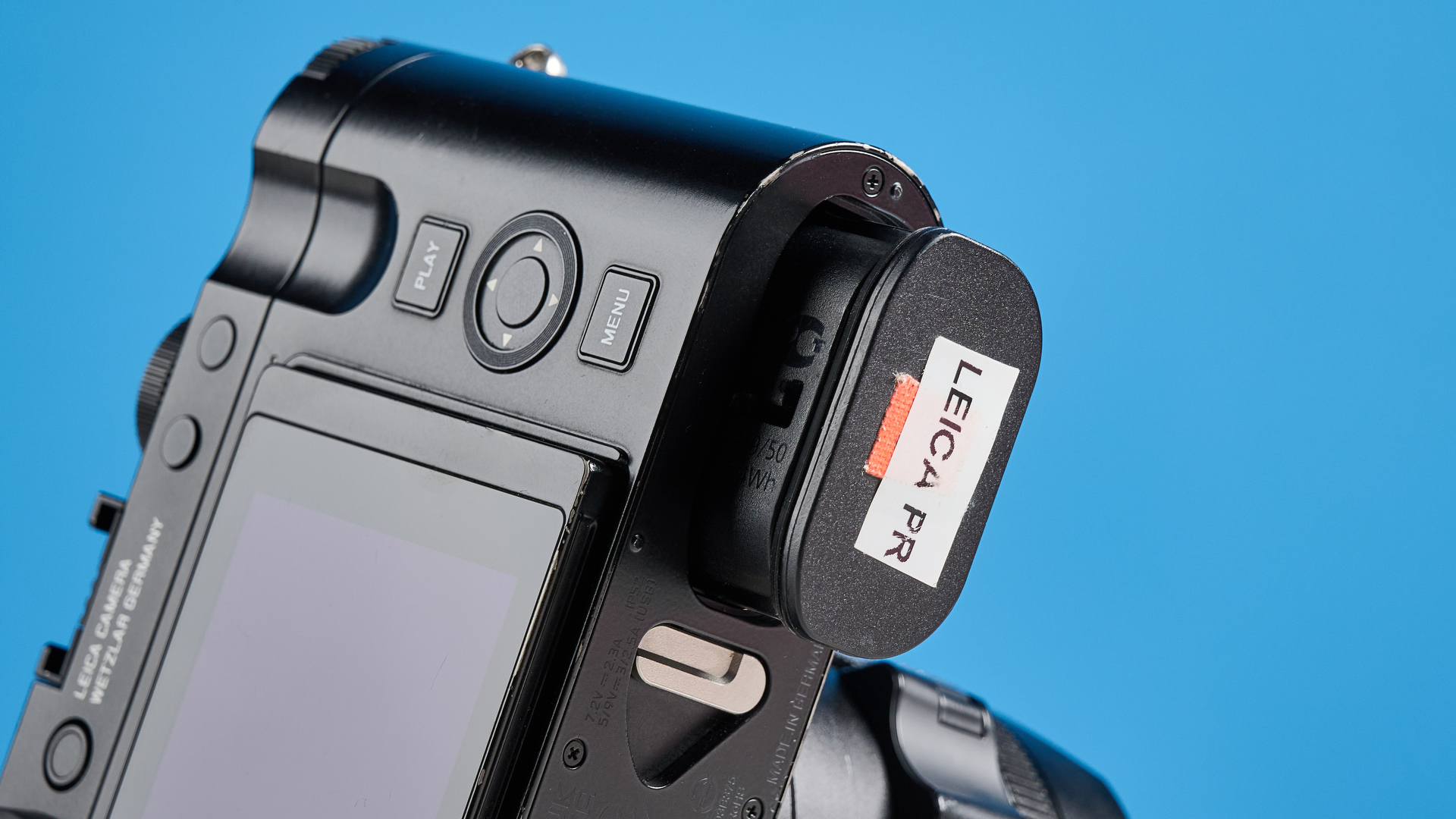 A black Leica Q3 43 camera