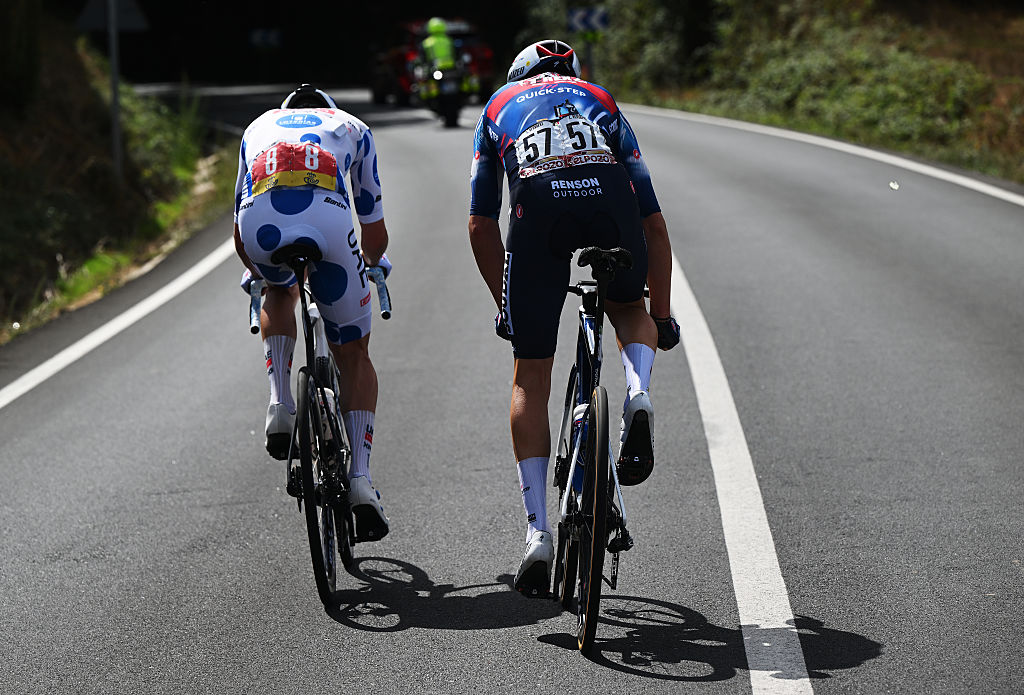 MONFORTE DE LEMOS, SPAIN - SEPTEMBER 07: (L-R) Jay Vine of Australia and UAE Team Emirates - XRG - Polka Dot Mountain Jersey and Louis Vervaeke of Belgium and Team Soudal Quick-Step compete in the breakaway during the La Vuelta - 80th Tour of Spain 2025, Stage 15 a 167.8km stage from A Veiga-Vegadeo to Monforte de Lemos / #UCIWT / on September 07, 2025 in Monforte de Lemos, Spain. (Photo by Dario Belingheri/Getty Images)
