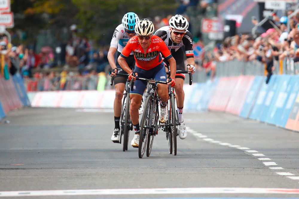 Domenico Pozzovivo drives to the line with Dumoulin and Froome in tow at the end of stage 18