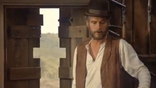 Paul Newman in a bowler hat and western wear in The Life And Times Of Judge Roy Bean