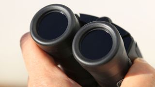 Close-up view of the objective lenses of the Eclipsmart 10x25