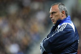 Avram Grant watches on during a Chelsea match at Hull City in September 2007.