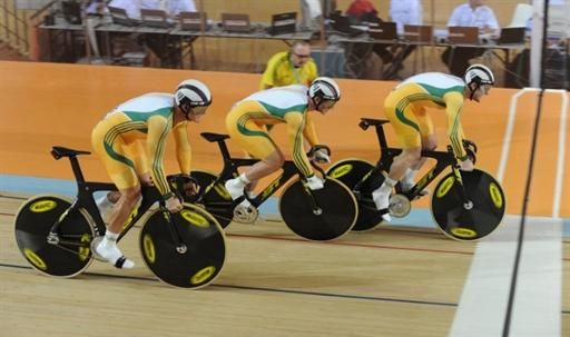 Australia's Daniel Ellis, Jason Niblett and Scott Sunderland start the team sprint final.