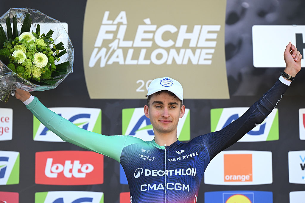 Paul Seixas of France celebrates on the podium as the winner of the 2026 Fleche Wallonne