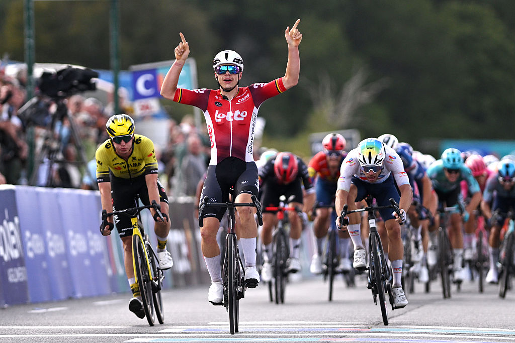 PLOUAY, FRANCE - AUGUST 31: Arnaud De Lie of Belgium and Team Lotto celebrates at finish line as race winner ahead of of (L-R) Olav Kooij of Netherlands and Team Visma | Lease a Bike and Emilien Jeanniere of France and Team TotalEnergies during the 89th Bretagne Classic - Ouest-France 2025 a 261.7km stage from Plouay to Plouay / #UCIWT / on August 31, 2025 in Plouay, France. (Photo by Luc Claessen/Getty Images)