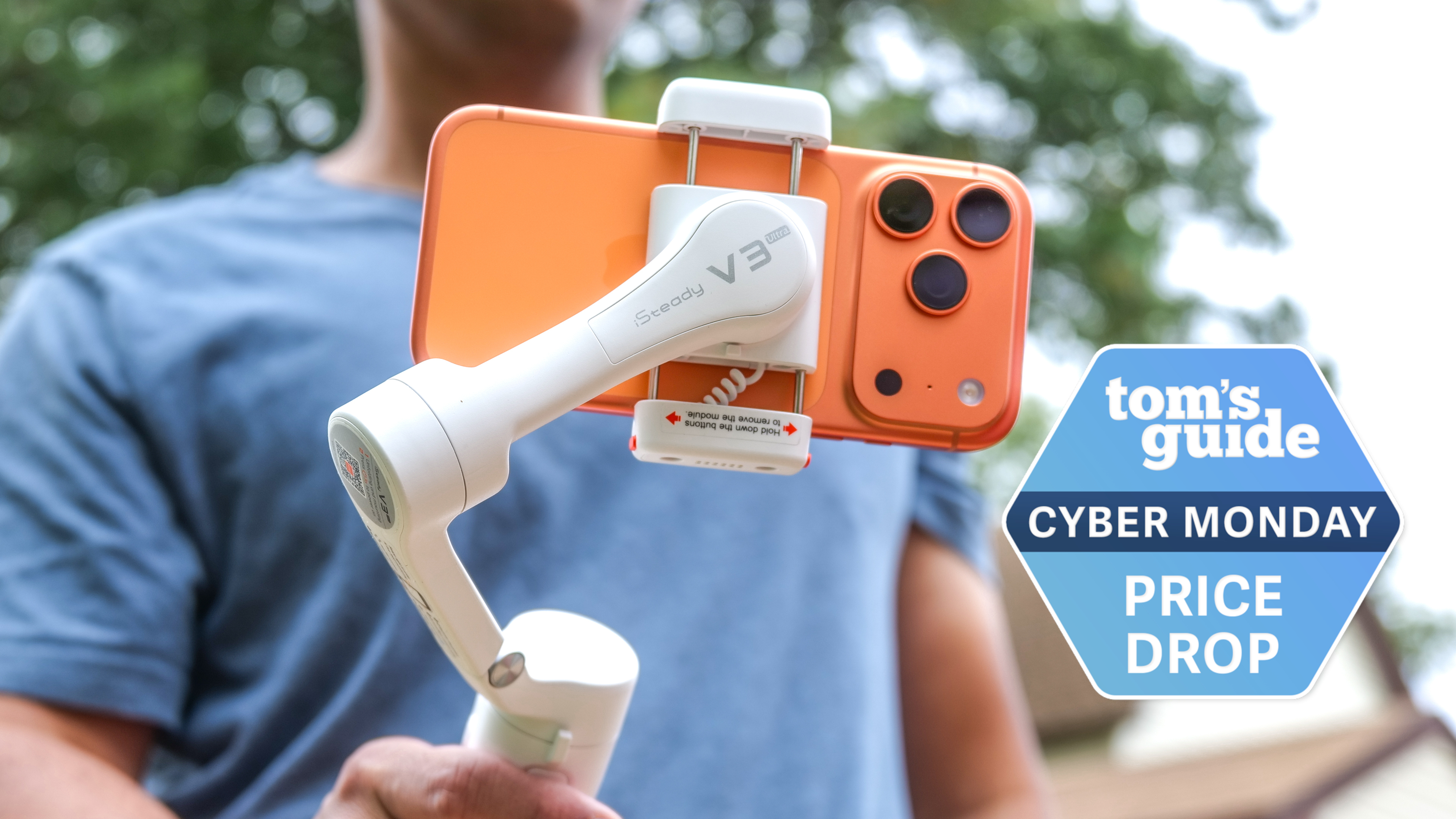 An iPhone 17 Pro Max in a DJI Osmo Mobile gimbal with a Tom's Guide Cyber Monday deals badge