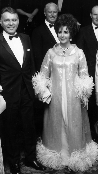 Elizabeth Taylor with her husband, Richard Burton (1925 - 1984) at Grosvenor House, London, for the BAFTA awards