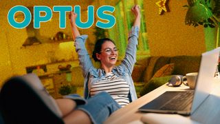 Woman wearing glasses sitting at computer with her feet on the desk. She's smiling and throwing her arms in the arm. The Optus logo is in the top left of the image.