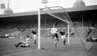 Jimmy Greaves scoring England in April 1961