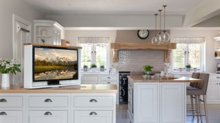 kitchen peninsular with pop up television