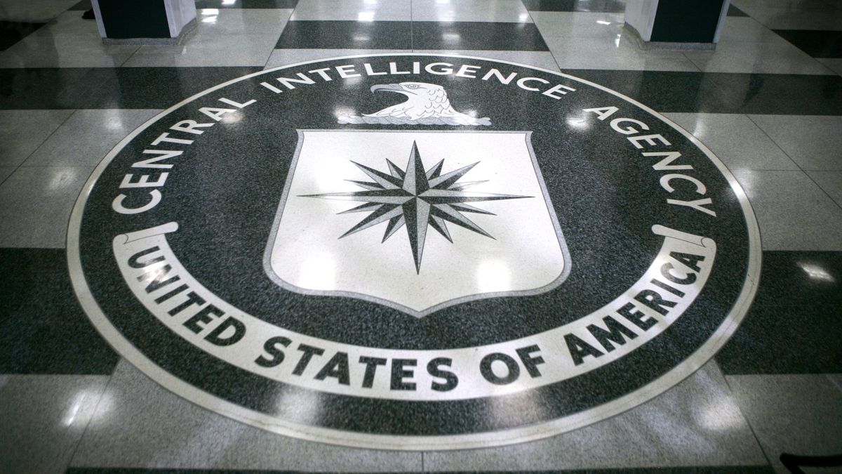 a seal on a marble floor that reads &quot;Central Intelligence Agency&quot;