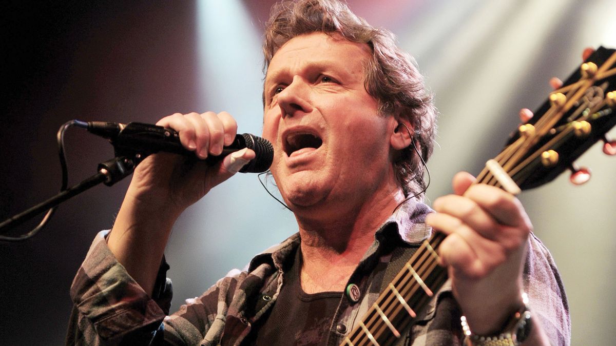 A photograph of John Wetton performing