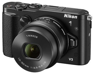 Nikon 1 v3, a mirrorless camera with phase detection AF.