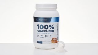 Tub of Transparent Labs 100% Grass Fed Whey Protein Isolate on a table