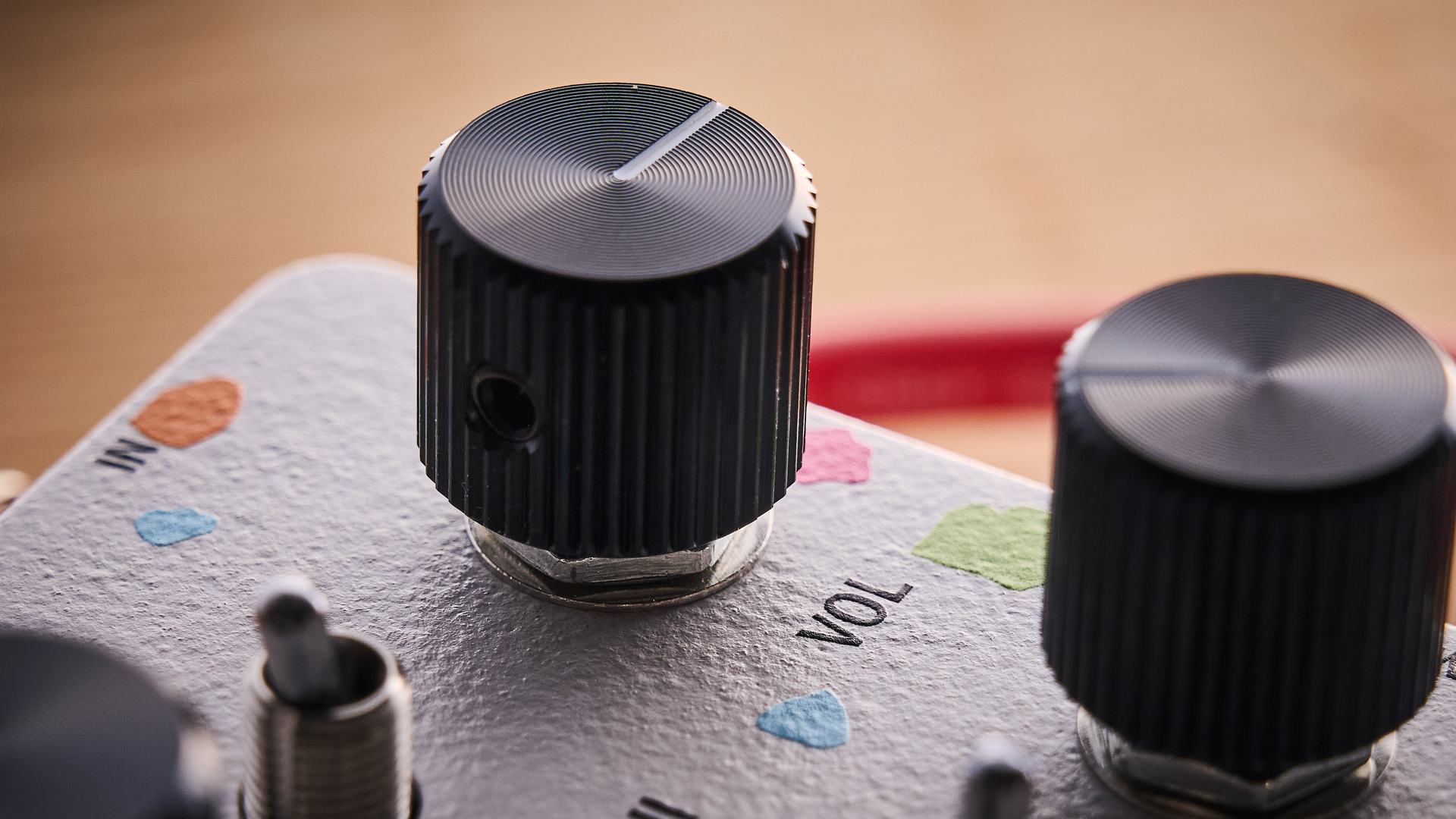 Close up of the volume knob on the Attic Audio Putty Saturation Preamp pedal