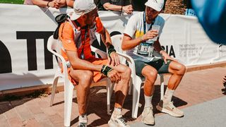 Caleb Olson and Jonathon Albon sitting down after taking first and second place in the Transgrancanaria 2025