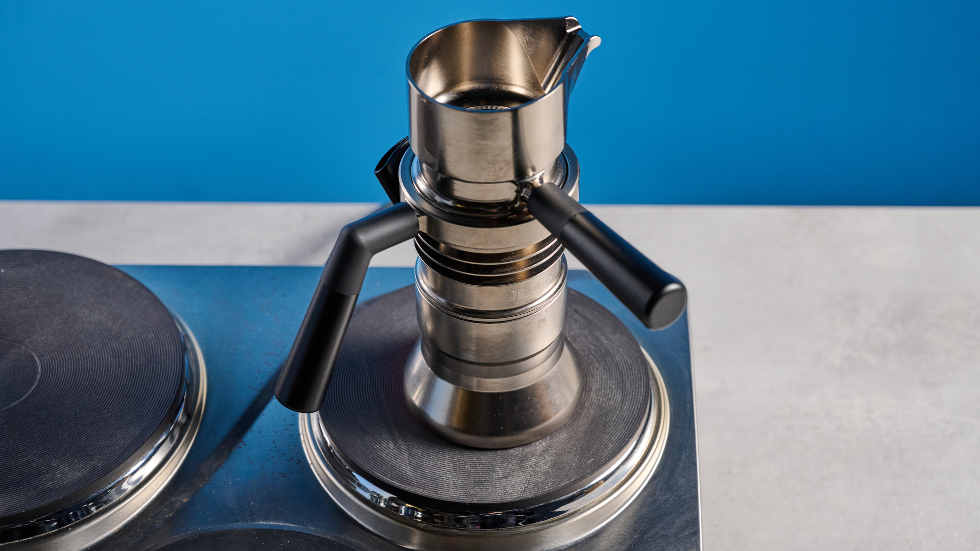 The 9Barista Espresso Machine Mk.2 on an electric stove