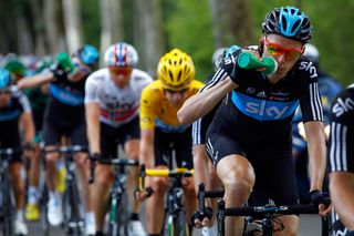 Christian Knees takes a drink from his bidon while leading Wiggins during stage 10 of the 2012 Tour