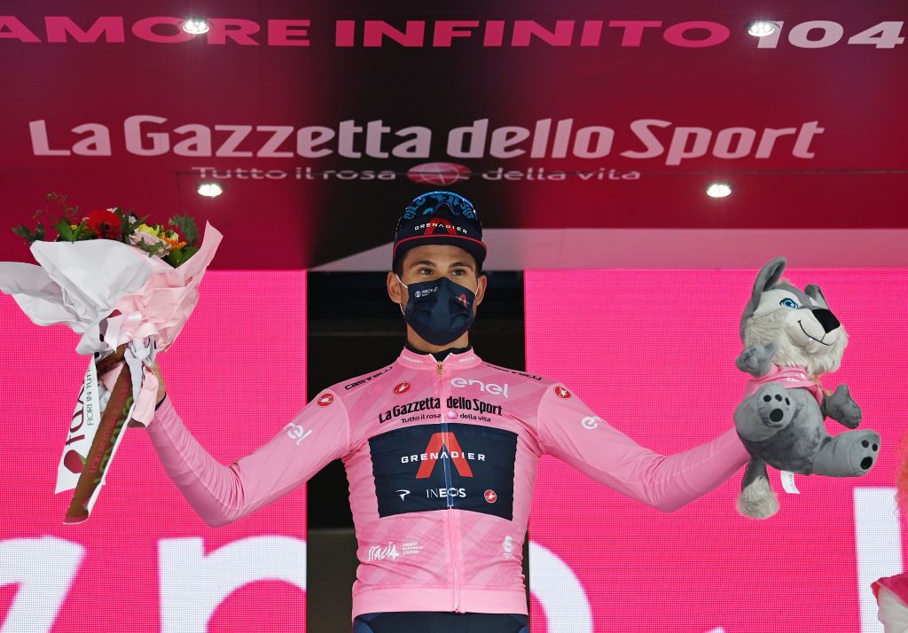 CANALE ITALY MAY 10 Filippo Ganna of Italy and Team INEOS Grenadiers Pink Leader Jersey celebrates at podium during the 104th Giro dItalia 2021 Stage 3 a 190km stage from Biella to Canale girodiitalia Mask Covid safety measures Mascot Giro on May 10 2021 in Canale Italy Photo by Stuart FranklinGetty Images