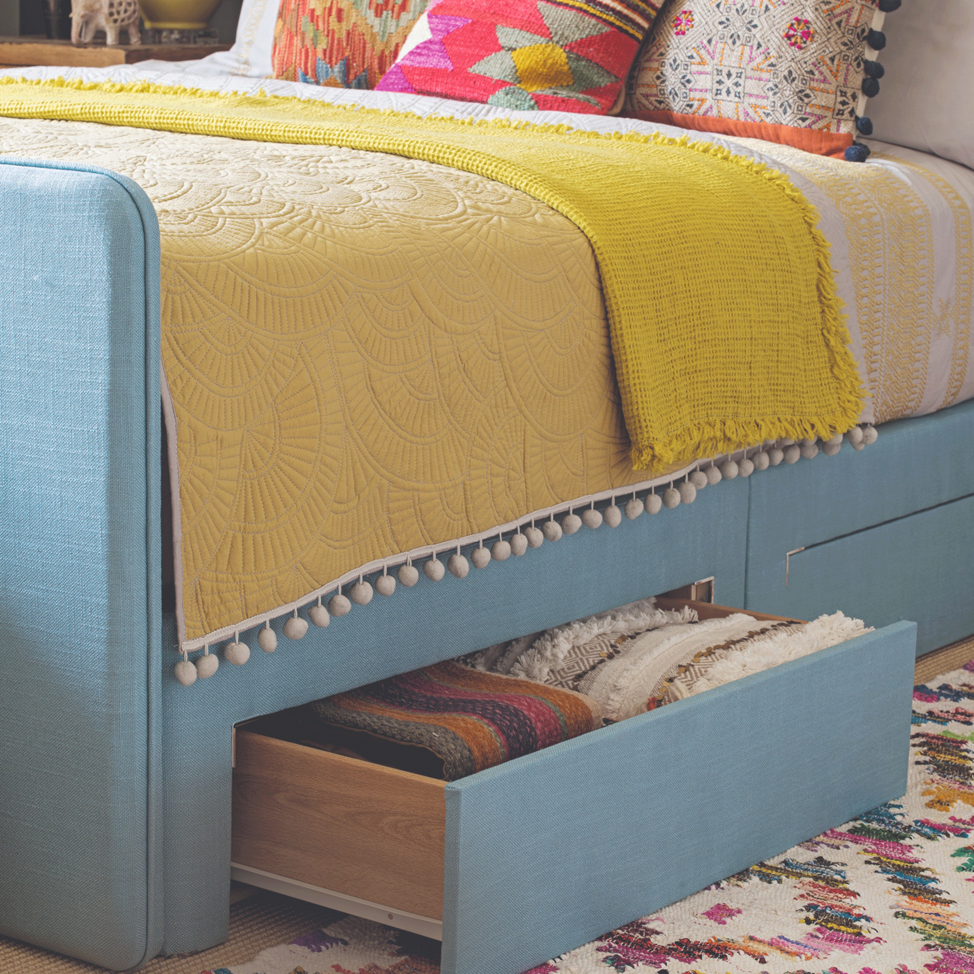 Blue bed with underbed storage