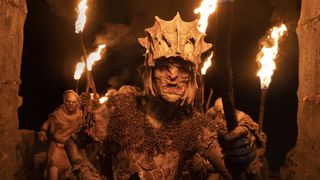 Orcs, carrying torches, as depicted in The Lord of the Rings: The Rings of Power