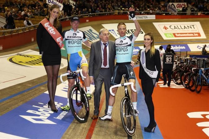 Five-time Gent Six-Day champion Iljo Keisse, right, is introduced prior to the 2013 edition's start. Left is Keisse's partner Wim Stroetinga and center is race organiser Patrick Sercu