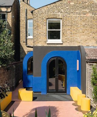 London blue extension with arched doors and window