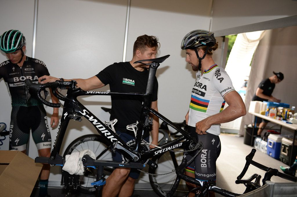 Peter Sagan chats with the team mechanic before the ride