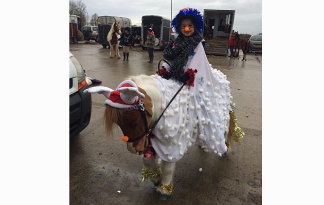 Hannah Mansfield&rsquo;s seven-year-old daughter Elizabeth and her pony Alfie as snowmen at a Christmas show