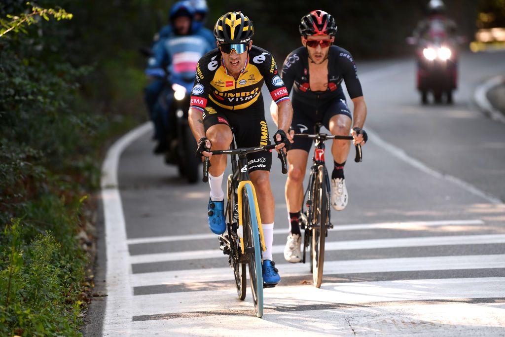 MILAN ITALY OCTOBER 06 LR Primoz Roglic of Slovenia and Team Jumbo Visma and Adam Yates of United Kingdom and Team INEOS Grenadiers compete in the breakaway during the 102nd MilanoTorino 2021 a 190km race from Magenta to Torino Superga 669m MilanoTorino on October 06 2021 in Milan Italy Photo by Tim de WaeleGetty Images