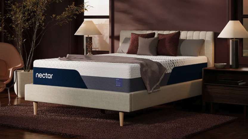 The Nectar Luxe Memory Foam Mattress on a bed frame in a bedroom