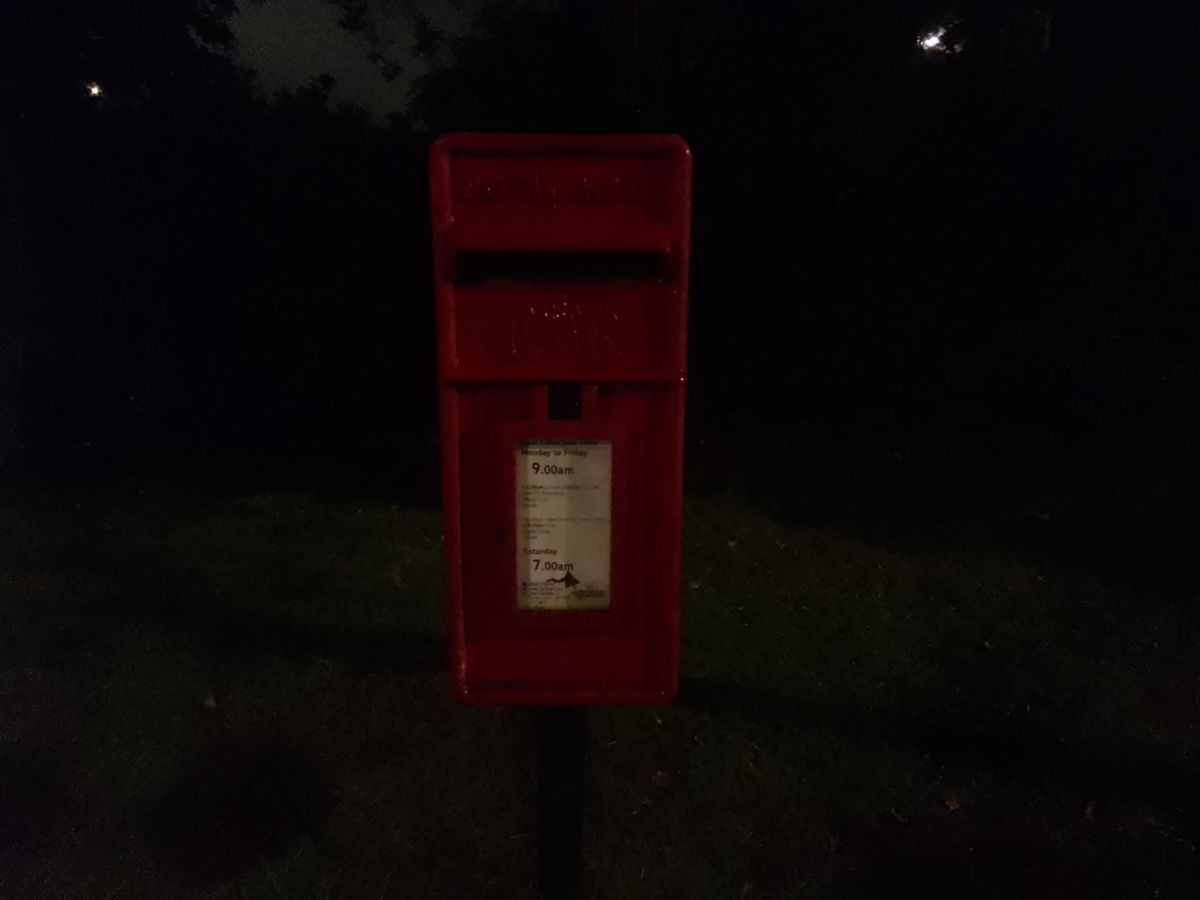Nokia T10 camera sample showing a postbox at night