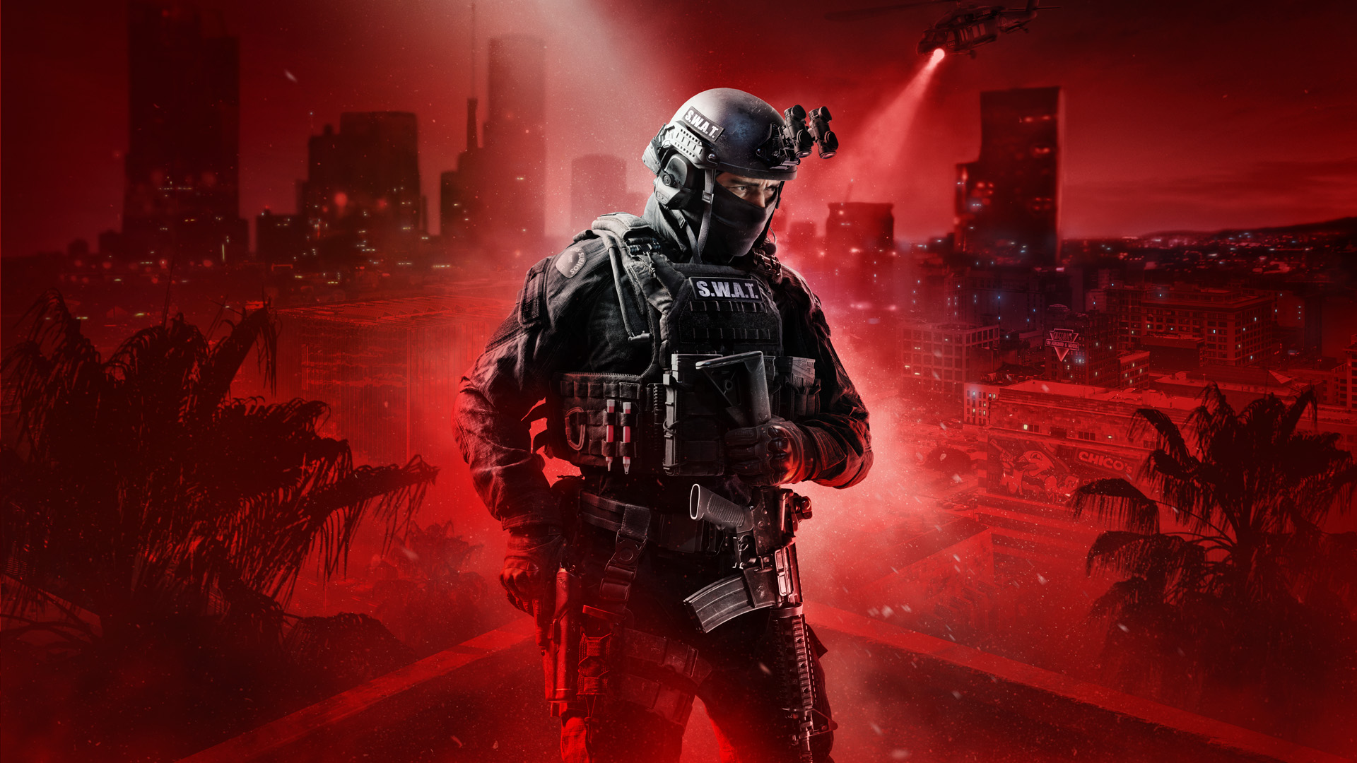SWAT officer standing in front of a city scape covered in a red light