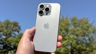 iPhone 16 Pro shown held in hand