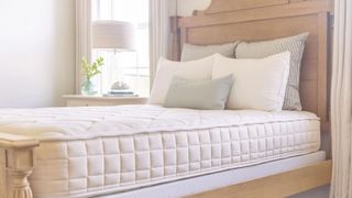 A Naturepedic Chorus mattress in a traditional bedroom