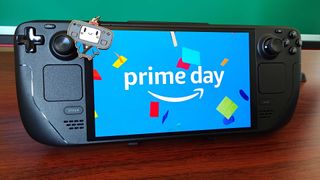 Steam Deck OLED with Prime Day logo on screen sitting on wood desk