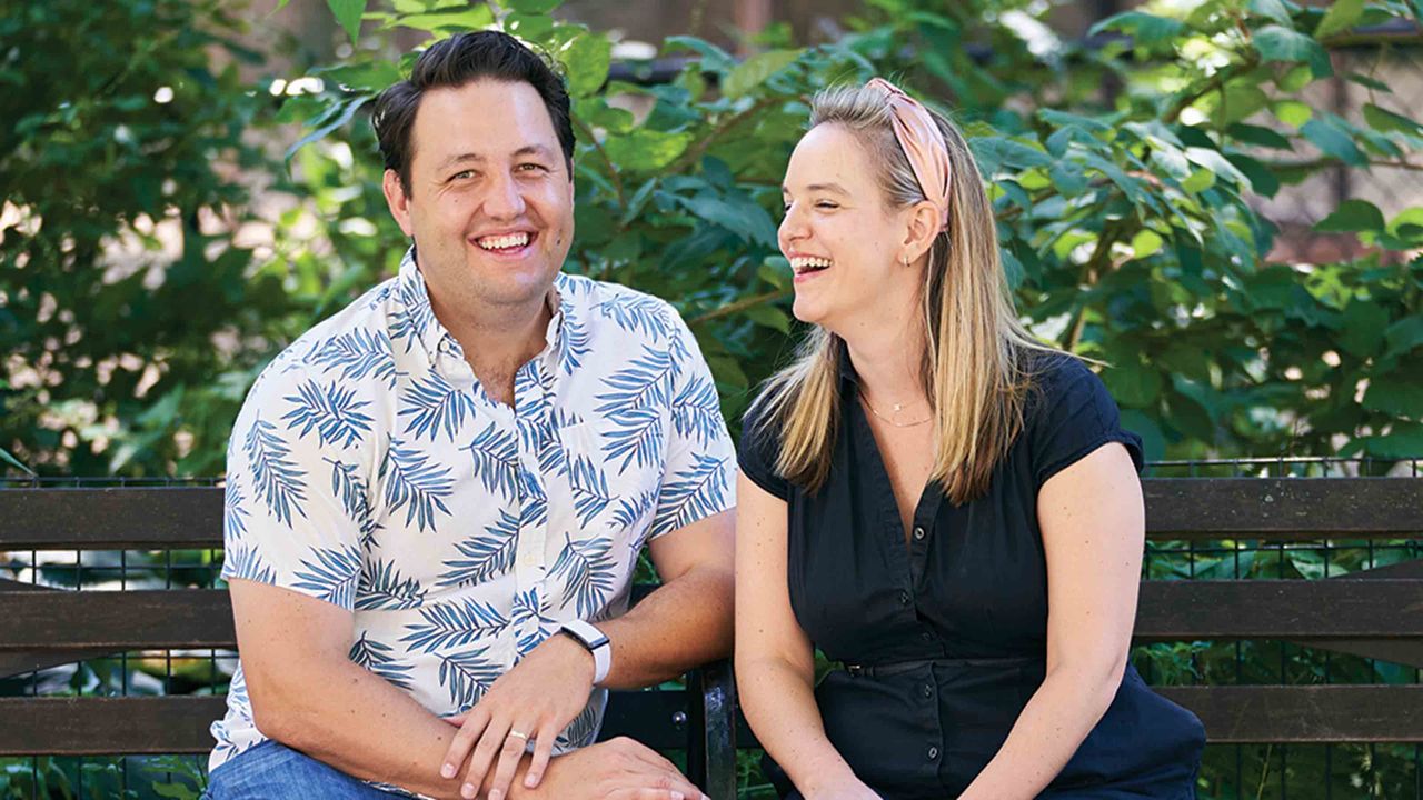 Comedians Noah Savage and Alyssa Wolff, laughing together