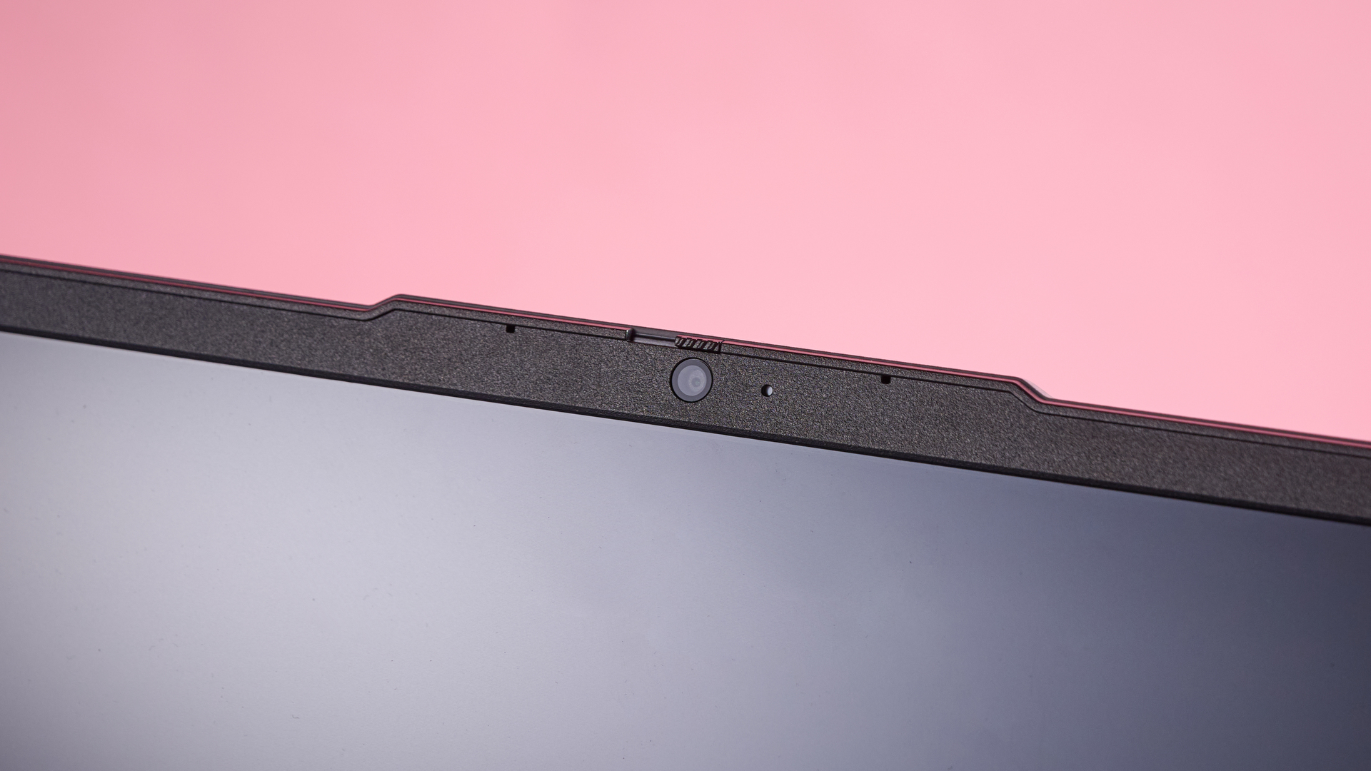 Close-up of webcam on Lenovo LOQ Essential Gen 9, open on desk