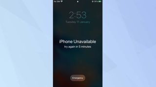 iOS 15 lock screen with "iPhone unavailable try again in 5 minutes" on the display
