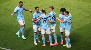 Manchester City players celebrate after Julian Alvarez scores the winner against Chelsea in May 2023.