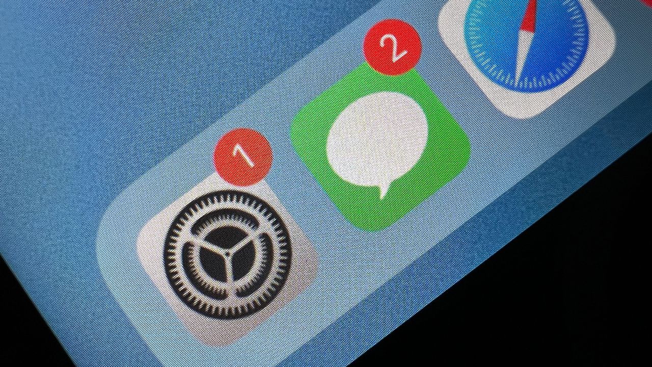A closeup of the 12.9in 2021 Apple iPad Pro showing the taskbar with several notification bubbles