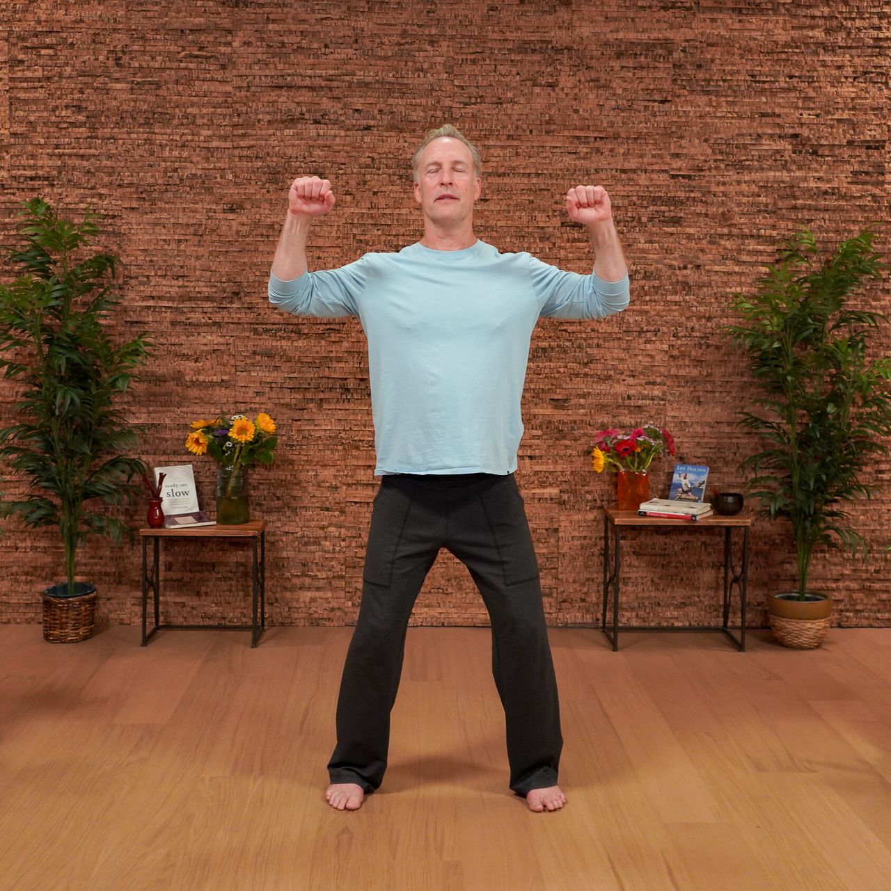 Man demonstrating Qigong movements